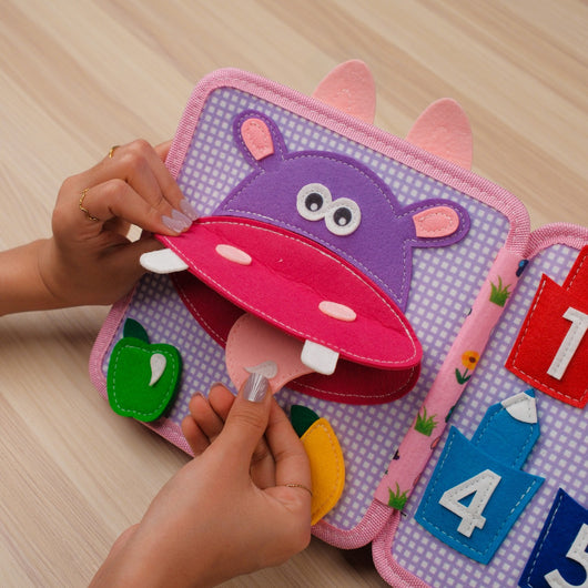 Pink Rabbit Quiet Book for Toddlers – hands-on sensory activities help keep little hands